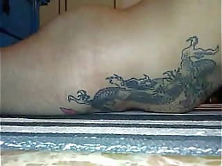 tanned shemale beauty strips off and plays with her shedick