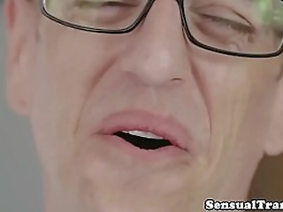 two hot ladyboys banging with a hairy guy in a hot threesome