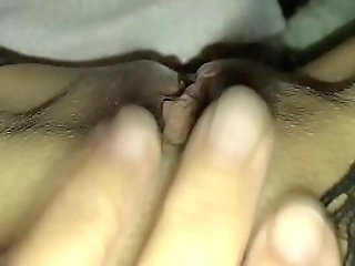 shemale baddie spreads her legs while fingering herself